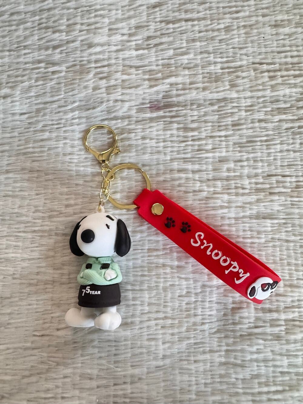 Snoopy keychain bag charm  with red strap and white Snoopy graphic super cute
